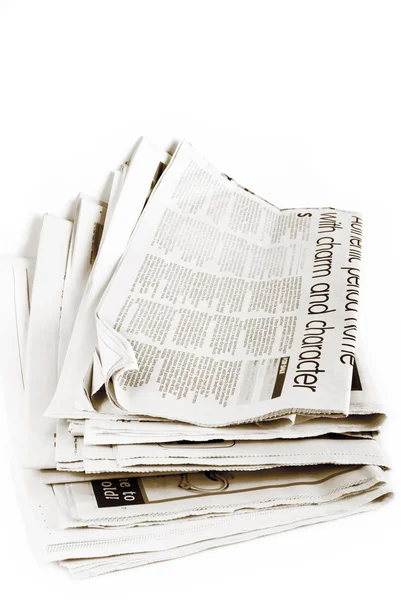 Stack of newspapers isolated — Stock Photo, Image