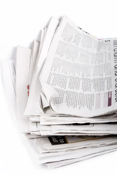 Stack of newspapers isolated Stock Photo