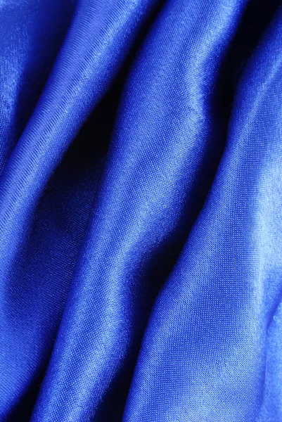 Текстура синей шелковой ткани — стоковое фото
