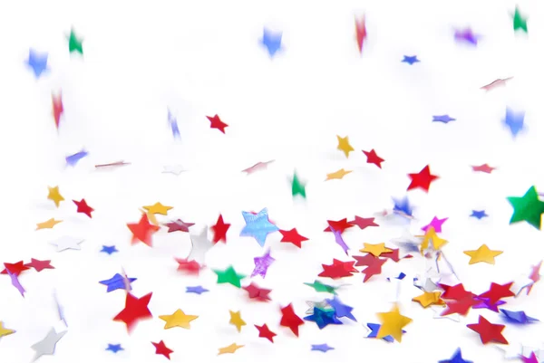 Confetti kleurrijke vliegende geïsoleerd op wit — Stockfoto