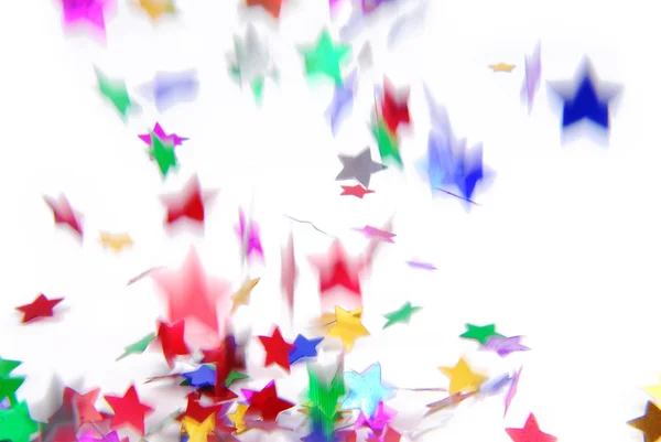Confetti colorful flying isolated on white — Stock Photo, Image