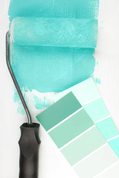 Paint roller and color chart choice — Stock Photo, Image
