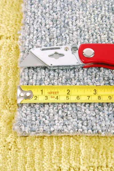 Carpet fitting with tools — Stock Photo, Image