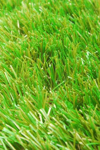 Gräs konstgjorda astroturf bakgrund — Stockfoto