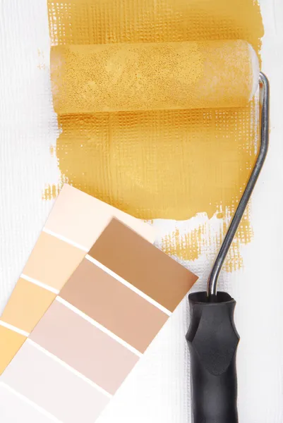 Paint roller and color chart choice — Stock Photo, Image