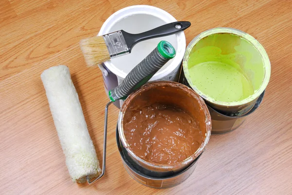 Paint cans and paint tools — Stock Photo, Image