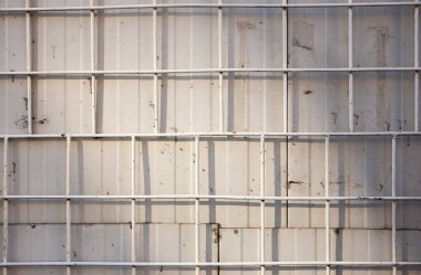 Beyaz metal kare çitin dokusu. 