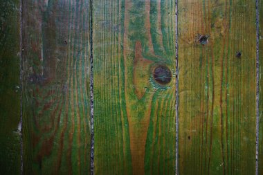 Eski ve yeşil ahşap zeminin dokusuna yakın görüntü. 