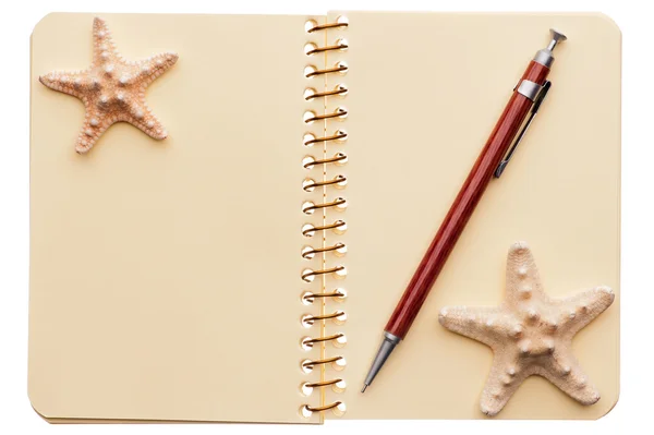 Notebook, penna, starfishes — Stockfoto