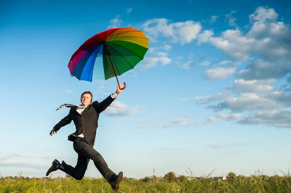 Courir avec parapluie — Photo