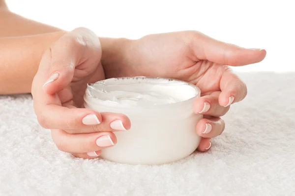 Woman holding cream — Stock Photo, Image