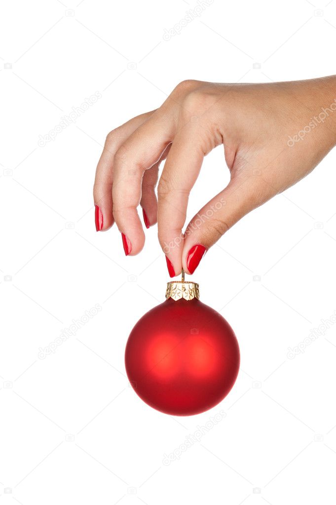 Holding christmas ball
