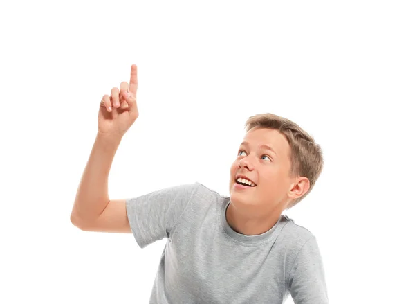 Teenage boy points up — Stock Photo, Image