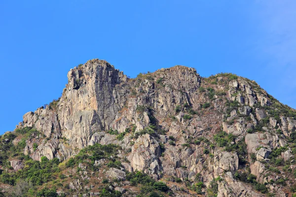 Lion Rock, lion like mountain in Hong Kong, one of the symbol of — Stock Photo, Image