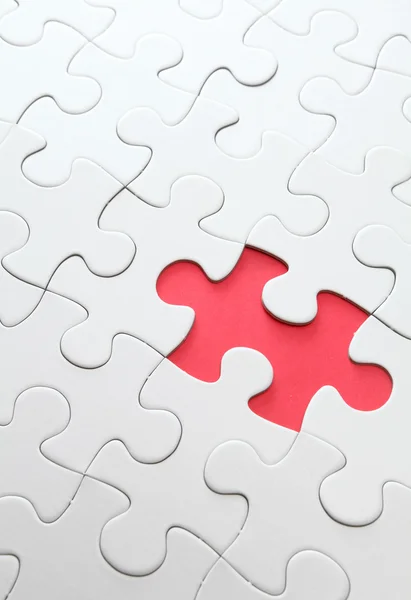 Puzzle with missing red piece — Stock Photo, Image