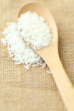Rice with wooden spoon