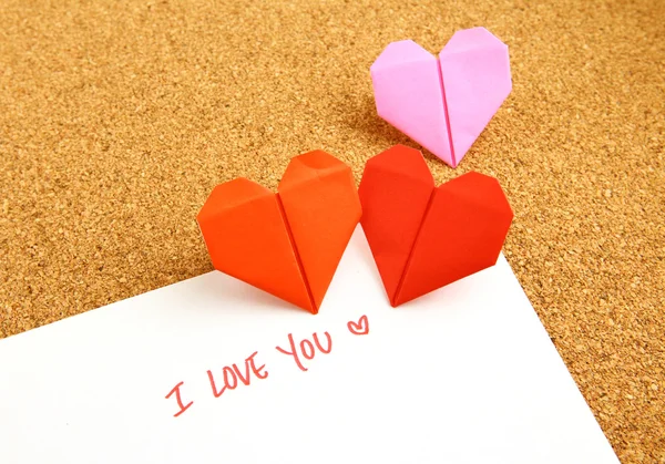 Origami paper hearts with message — Stock Photo, Image