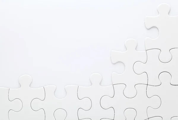 Puzzle su sfondo bianco — Foto Stock