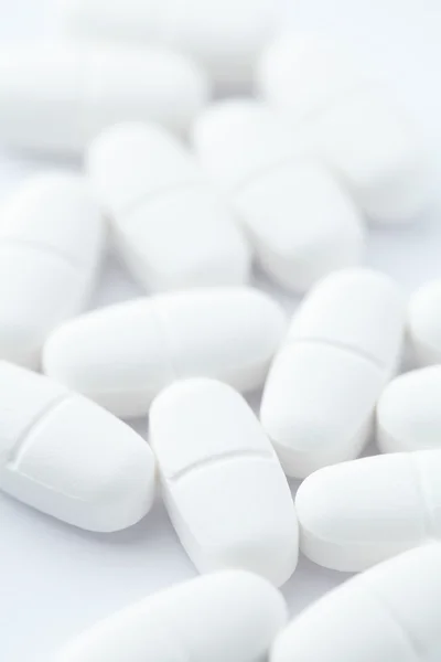 Tabletki białe — Zdjęcie stockowe