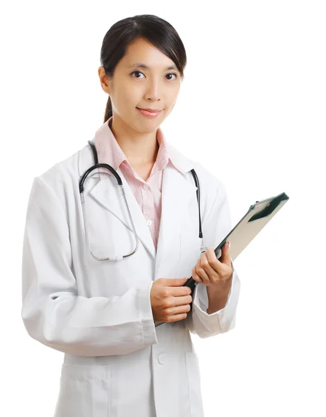 Young female doctor with patient file chart — Stock Photo, Image