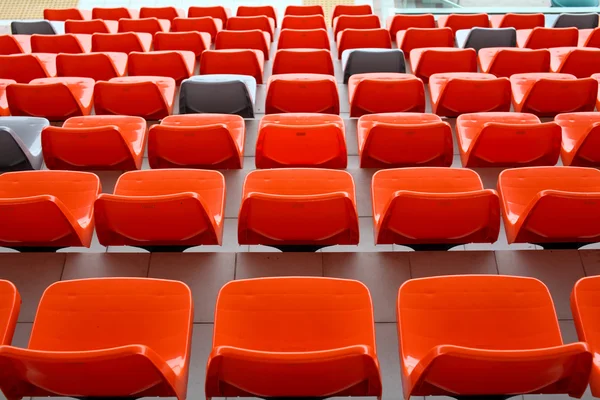 Red audience seat in stadium — Stock Photo, Image