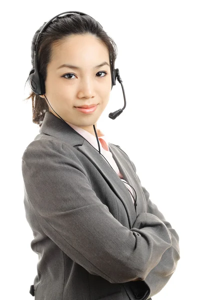 Mujer de negocios asiática con auriculares —  Fotos de Stock