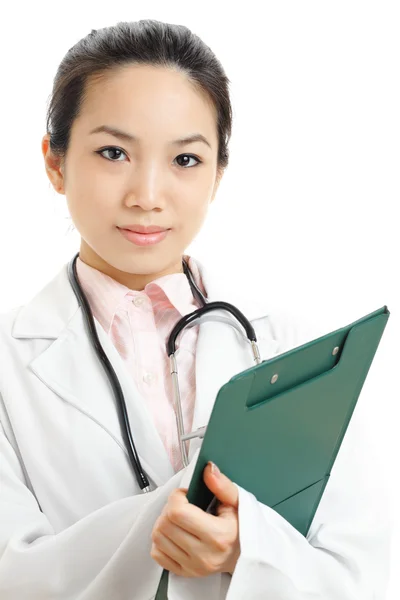 Asiatico donna medico con scrittura pad — Foto Stock