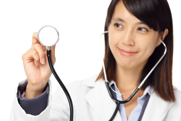 Asian female doctor holding stethoscope — Stock Photo, Image