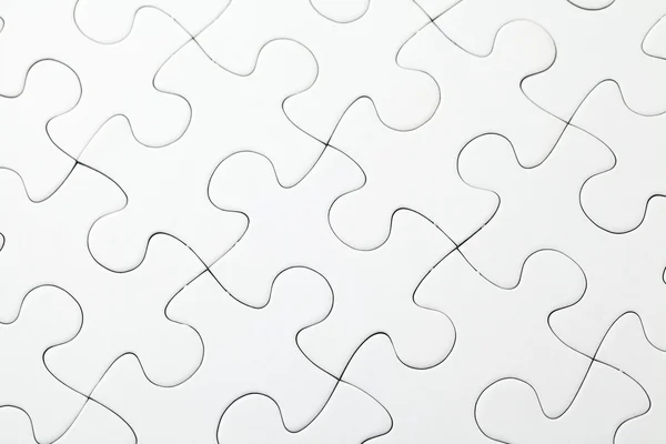 完成した白いパズルの一部 — ストック写真