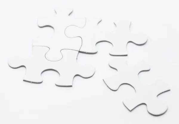 Peças de puzzle branco — Fotografia de Stock