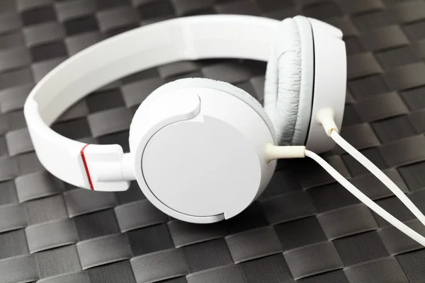 Headphone on black mat — Stock Photo, Image