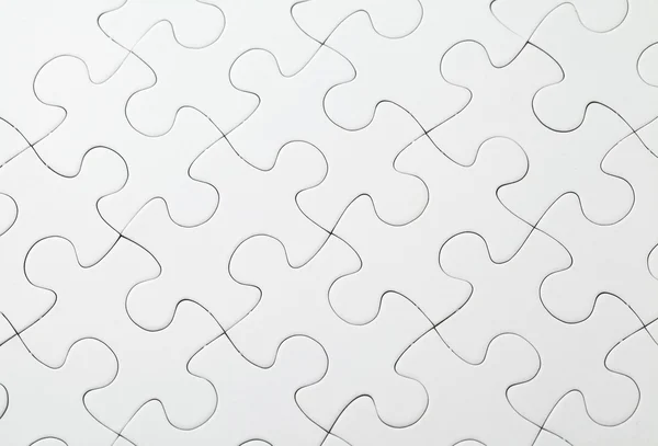 Část dokončení bílé puzzle — Stock fotografie