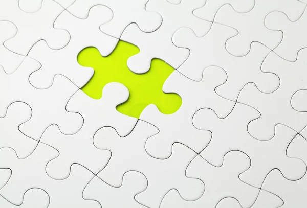 Missing puzzle piece in green color — Stock Photo, Image