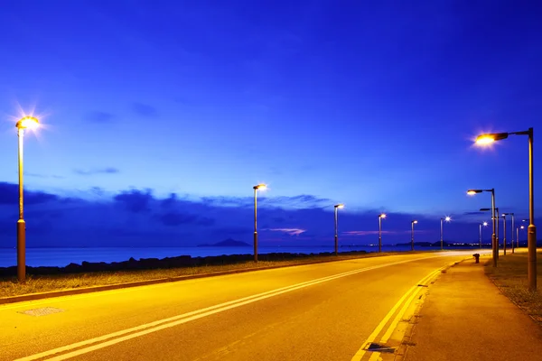 Empty asphalt road at night — Stock Photo, Image