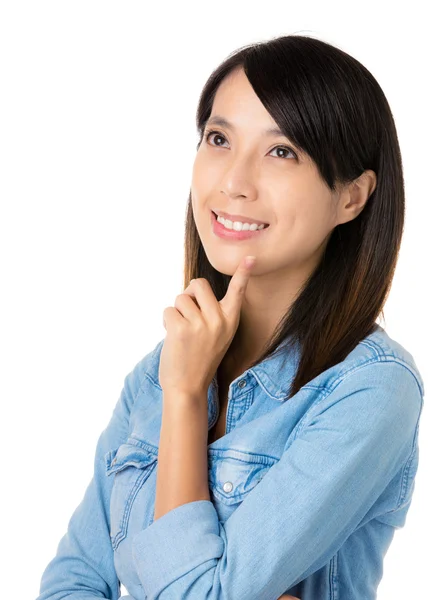 Asian thoughtful woman looking up — Stock Photo, Image