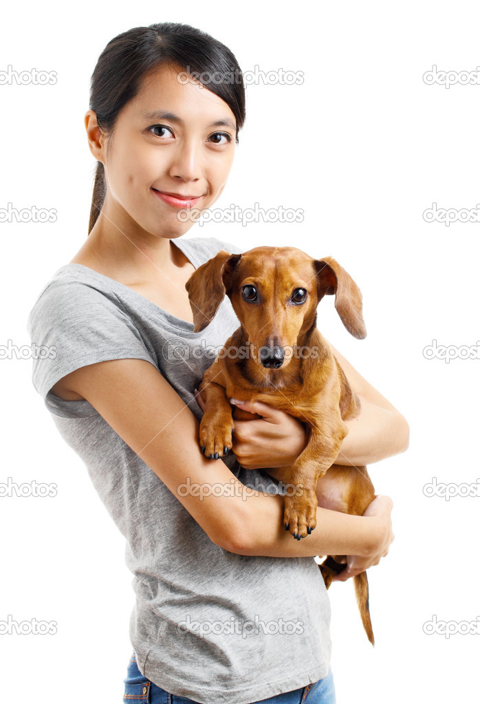 Asian woman with dachshund dog