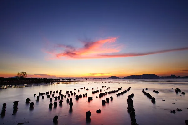 Захід сонця з моря — стокове фото