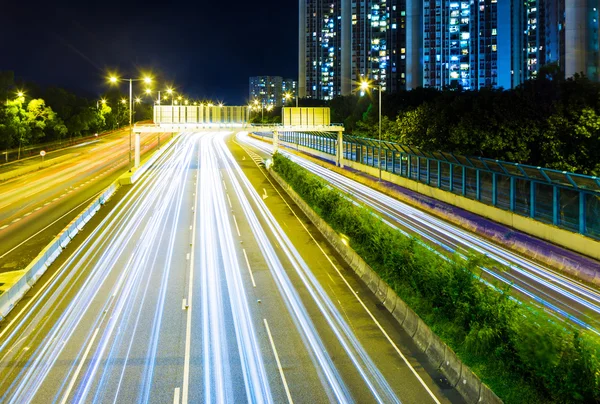 Busy traffic on highway at night — Stock Photo, Image