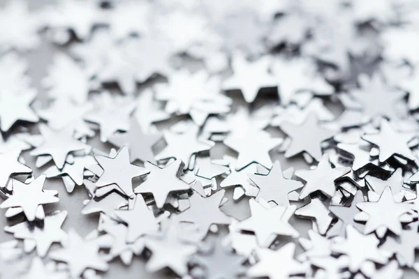 Scattered glittering stars confetti — Stock Photo, Image