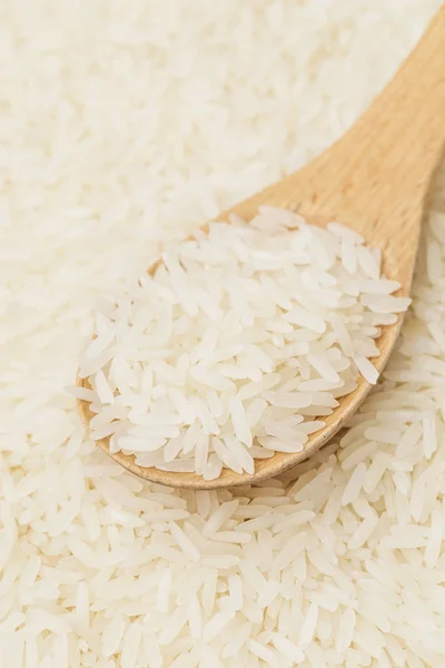 White rice on teaspoon — Stock Photo, Image