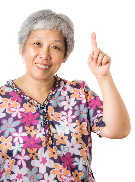Asian old woman pointing up — Stock Photo, Image