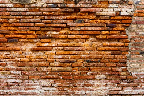 Ancient brick wall in red color — Stock Photo, Image