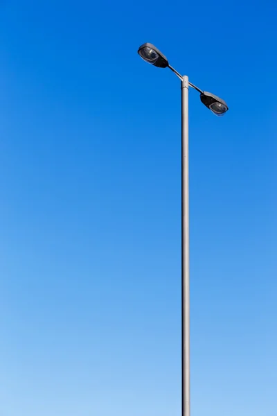 Lighting pole with blue sky — Stock Photo, Image