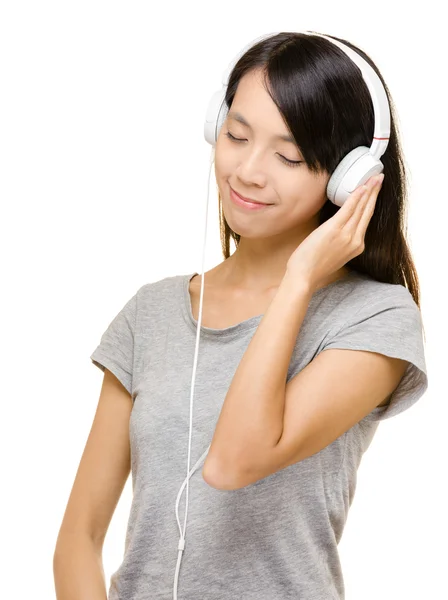 Asian woman enjoy the music — Stock Photo, Image