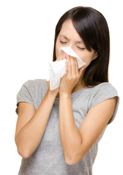 Sneezing asian woman — Stock Photo, Image