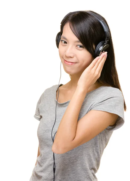 Asian woman listening to music — Stock Photo, Image