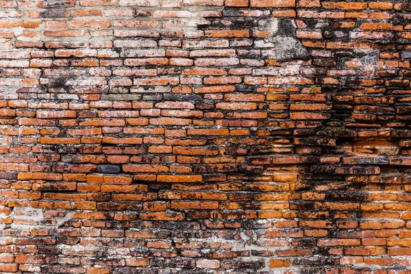 Ancient brick wall in red color — Stock Photo, Image