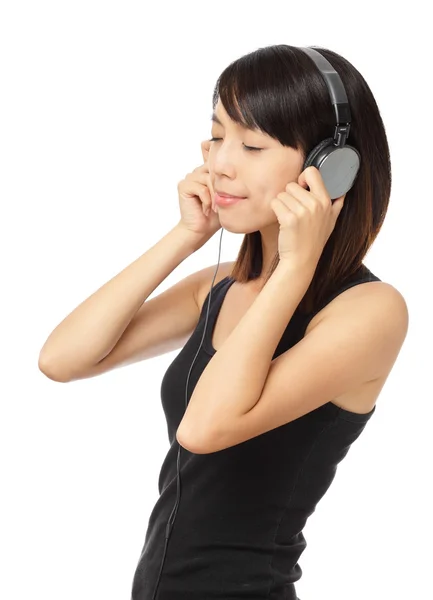 Asian woman enjoy the music — Stock Photo, Image