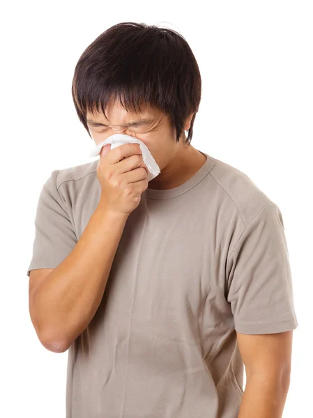 Sneezing asian man — Stock Photo, Image