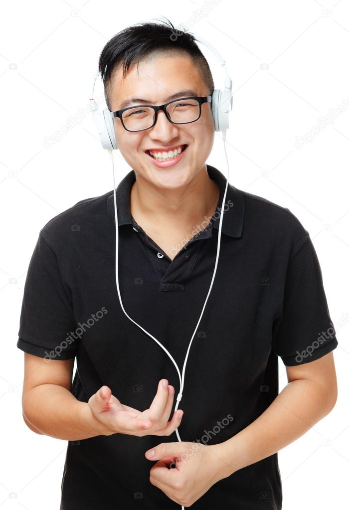Asian man enjoy listen to music